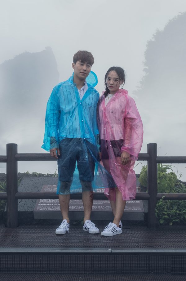 Couple in Plastic Raincoats, Seongsan Ilchulbong, Jeju-do